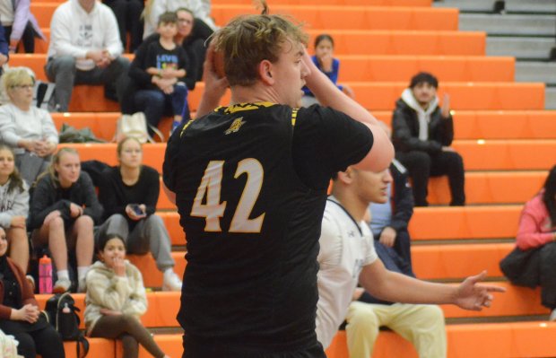 Andrew's Grantas Sakenis pulls down a rebound against Stagg during a SouthWest Suburban Red game in Palos Hills on Tuesday, Feb. 6, 2024. (Jeff Vorva / Daily Southtown)