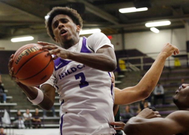 Thornton's Chase Abraham (2) grabs a rebound away from Evergreen Park during the Class 3A Thornton Sectional basketball semifinals on Tuesday February 27, 2024. (John Smierciak for the Daily Southtown)