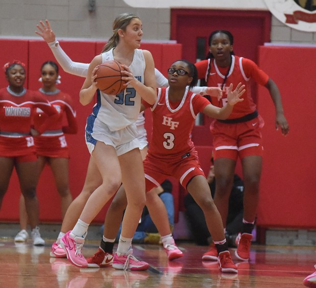 Homewood-Flossmoor's Aunyai Deere (3) defends Nazareth's Stella Sakalas (32) during the Class 4A Hinsdale Central Supersectional Monday, February 26, 2024 in Hinsdale, IL. (Steve Johnston/for the Daily Southtown)