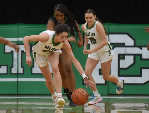 Providence's Bella Morey (21) scoops up the loose ball and starts a fast break against Morgan Park during a Class 3A Providence Regional semifinal Tuesday, February 13, 2024 in New Lenox, IL. (Steve Johnston/Daily Southtown)