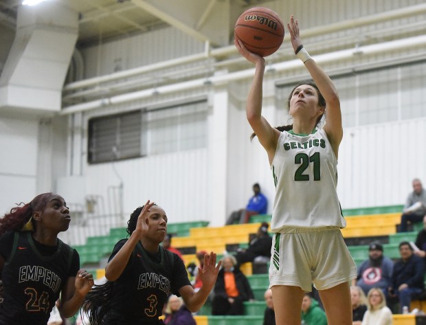 Providence's Bella Morey (21) drives to the basket against Morgan Park during a Class 3A Providence Regional semifinal Tuesday, February 13, 2024 in New Lenox, IL. (Steve Johnston/Daily Southtown)