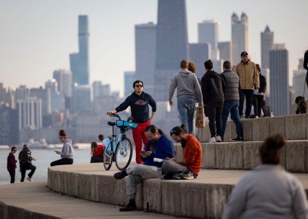 People enjoy the mild weather along the lakefront Sunday, Feb. 25, 2024, in Chicago. (Brian Cassella/Chicago Tribune)