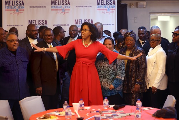 Candidate for Congress (7th Dist.) and City Treasurer Melissa Conyears-Ervin talks following a group photo with over 25 clergy members and supporters at the Greater Missionary Baptist Church on Wednesday, Feb. 28, 2024, in Chicago. (Antonio Perez/ Chicago Tribune)