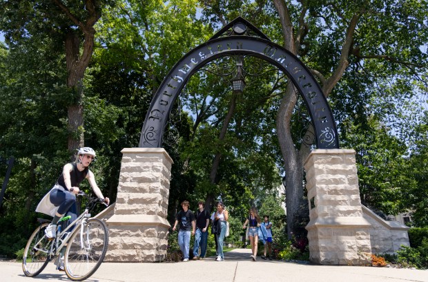 People walk through The Arch at Northwestern University on Monday, July 10, 2023, in Evanston. (Brian Cassella/Chicago Tribune)