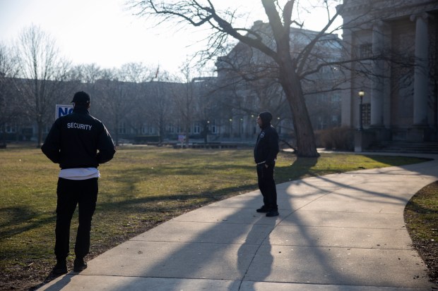 Chicago Public Schools security guards patrol the campus at Senn High School in Chicago on Feb. 1, 2024, the day after three students were shot, one fatally. (Vincent Alban/Chicago Tribune)