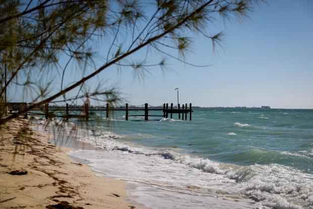 A pier and beach in Adelaide Village, on Nassau, Bahamas on Dec. 15, 2022.