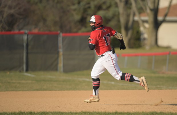 Yorkville's Kameron Yearsley (17) rounds the bases after a two run home run against Geneva during in Yorkville on Thursday, March 21, 2024. (Mark Black / for the Beacon-News)
