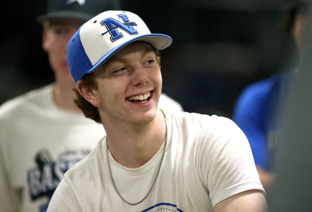 St. Charles North senior shortstop Jackson Spring reacts during a team meeting after practice at the Dirtbags workout facility on Wednesday, March 20, 2024 in South Elgin. Spring is also an ardent golfer.H. Rick Bamman / For the Beacon-News