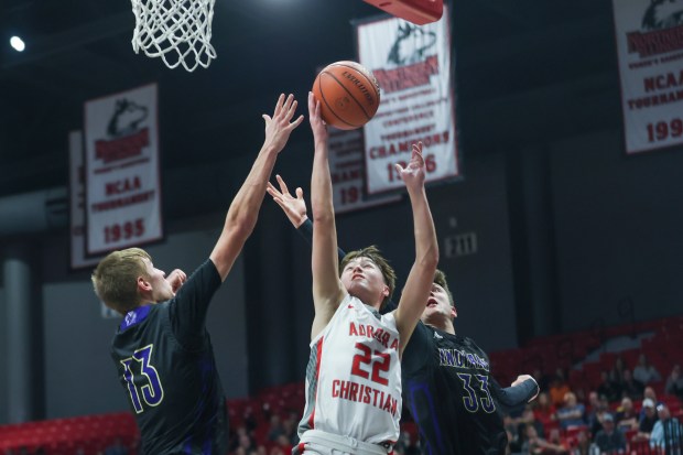 Aurora Christian's Jacob Baumann (22) goes up for a layup during the Class 1A NIU Supersectional game against Pecatonica at NIU Convocation Center in DeKalb on Monday, March 4, 2024. (Troy Stolt/for the Aurora Beacon News)