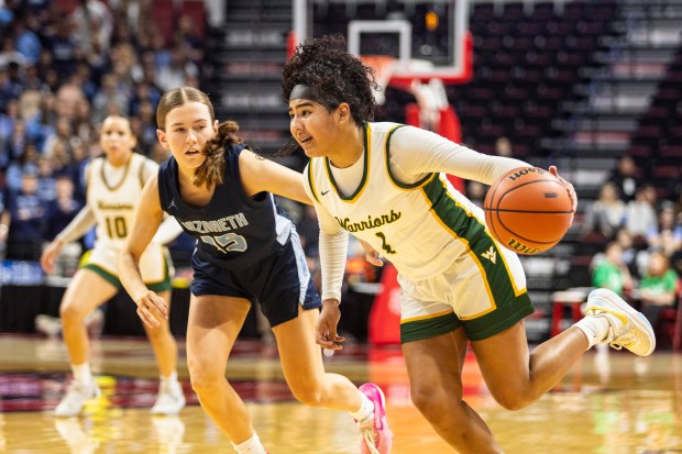 Waubonsie Valley's Arianna Garcia (1) drives to the basket against Nazareth during the Class 4A state semifinal game at CEFCU Arena in Normal on Friday, March 1, 2024. (Vincent D. Johnson / The Beacon-News)