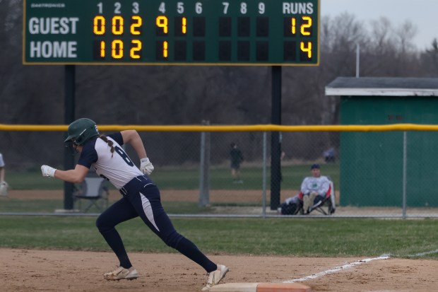 Bartlett's Christina Stankus (8) runs to second base during the fifth inning of a game against Waubonsie Valley in Aurora on Wednesday, March 13, 2024. (Troy Stolt/for the Aurora Beacon News)