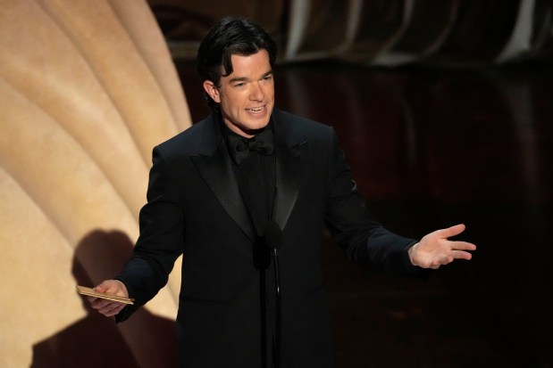 John Mulaney presents the award for best sound during the Oscars on Sunday, March 10, 2024, at the Dolby Theatre in Los Angeles. (AP Photo/Chris Pizzello)