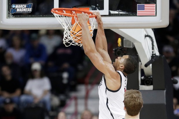 San Diego State forward Jaedon LeDee dunks during the first half of a second-round college basketball game against Yale in the NCAA Tournament in Spokane, Wash., Sunday, March 24, 2024. (AP Photo/Young Kwak)