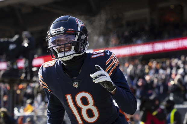 Bears wide receiver Dante Pettis celebrates after making a touchdown catch in against the Bills on Dec. 24, 2022, at Soldier Field. (E. Jason Wambsgans/Chicago Tribune)