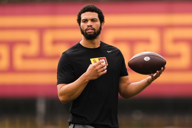 USC quarterback Caleb Williams warms up at the school's pro day on March 20, 2024. (AP Photo/Ryan Sun)