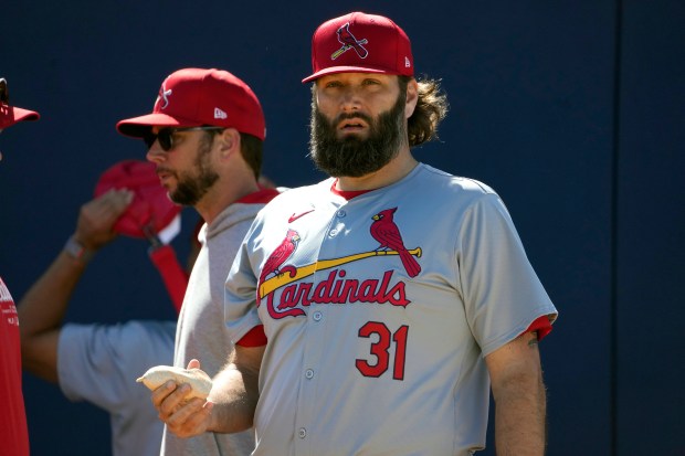 Cardinals pitcher Lance Lynn holds a rosin bag during a spring training workout on Feb. 21, 2024, in Jupiter, Fla. (Jeff Roberson/AP photo)