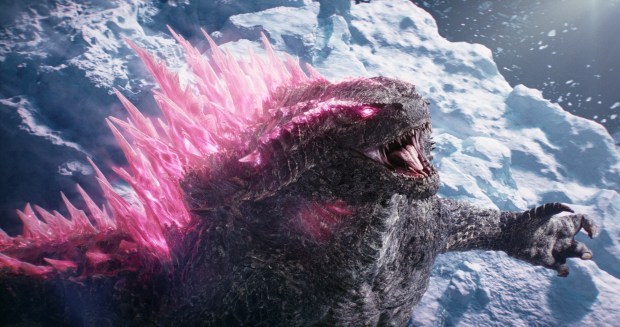 Godzilla, thinking pink and apparently just coming out of a Hollow Earth screening of "Barbie," in the new "Godzilla X Kong: The New Empire." (Warner Bros. Pictures via AP)