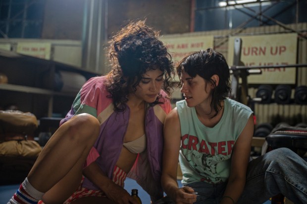 Katy O'Brian, left, and Kristen Stewart in a scene from "Love Lies Bleeding." (Anna Kooris/A24 via AP)