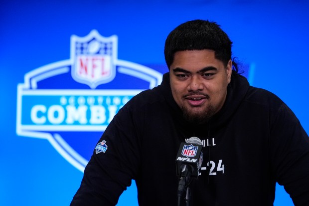 Oregon State offensive lineman Taliese Fuaga speaks during a news conference at the NFL scouting combine on March 2, 2024, in Indianapolis. (AP Photo/Michael Conroy)