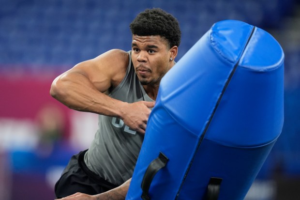 Penn State defensive lineman Chop Robinson runs a drill at the NFL scouting combine on Feb. 29, 2024, in Indianapolis. (AP Photo/Michael Conroy)