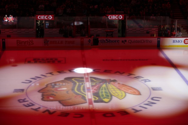 The Blackhawks logo is seen at center ice during a game against the Lightning on Nov. 16, 2023, at the United Center. (Trent Sprague/Chicago Tribune)