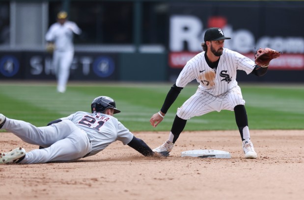 Chicago White Sox tries to catch Detroit Tigers outfielder Mark Canha stealing during the fourth inning of the game at Guaranteed Rate Field in Chicago on March 31, 2024. (Eileen T. Meslar/Chicago Tribune)