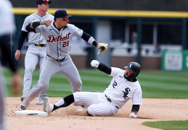 Detroit Tigers shortstop Javier Baez, 28, tries to get a double play after getting Chicago White Sox left fielder Kevin Pillar, 12, out at second base during the seventh inning of the game at Guaranteed Rate Field in Chicago on March 31, 2024. (Eileen T. Meslar/Chicago Tribune)