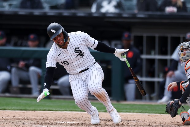 Chicago White Sox third baseman Yoan Moncada, 10, falls in pain during the eighth inning of the game against the Detroit Tigers at Guaranteed Rate Field in Chicago on March 31, 2024. (Eileen T. Meslar/Chicago Tribune)