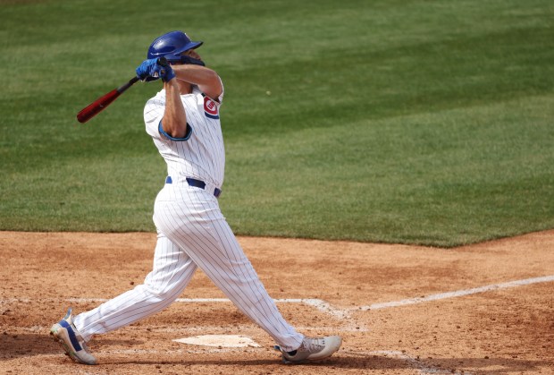 Chicago Cubs 1st baseman Matt Mervis flies out to center against the San Diego Padres at Sloan Park on Sunday, Feb. 25, 2024, in Mesa, Arizona. The Cubs lost to the Padres 7-0. (Stacey Wescott/Chicago Tribune)