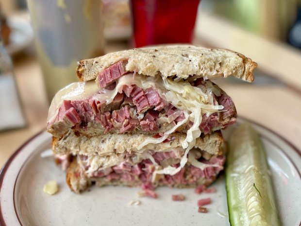 Reuben sandwich with 7 ounces of corned beef, Swiss cheese, sauerkraut and Russian dressing on toasted rye bread at Schneider Deli in the River North neighborhood of Chicago on February 16, 2024. (Louisa Chu / Chicago Tribune)