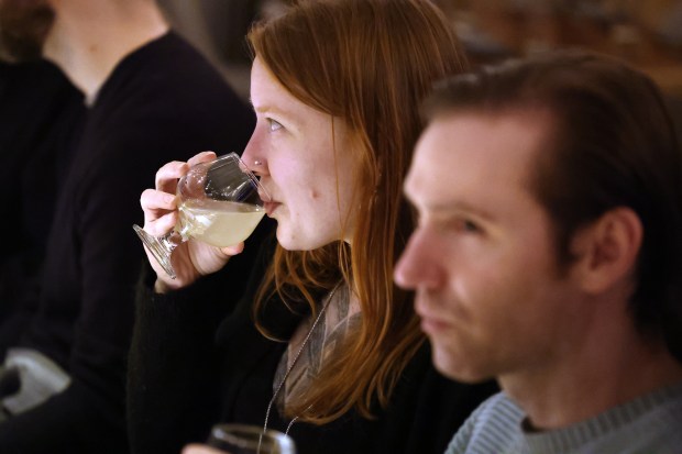 Victoria Homza and Pace Nalbone, both of Pittsburgh, eat from the omakase menu and drink sake at Jinsei Motto, the sushi bar and izakaya on W. Randolph Street in Chicago, on March 22, 2024. (Terrence Antonio James/Chicago Tribune)