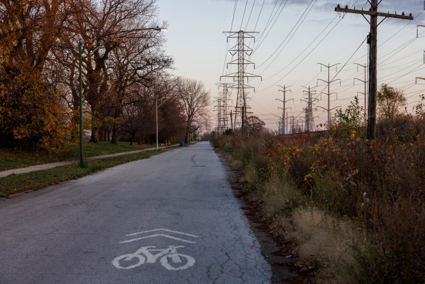 Road markers directing cyclists to the Marquette Greenway sits near the intersection of East 102nd Street and South Avenue G, Nov. 9, 2022 in Chicago. (Armando L. Sanchez/Chicago Tribune)