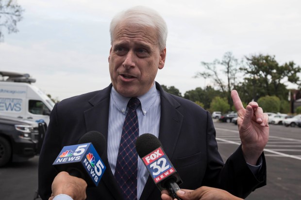 Delegate Mark Shaw, then-Lake County GOP chairman, speaks to the media before a rally in Kildeer, Ill. on Oct. 13, 2017, to protest the raffling off of guns to donors attending a Lake County Republican Central Committee fundraiser. (Lou Foglia/Chicago Tribune)