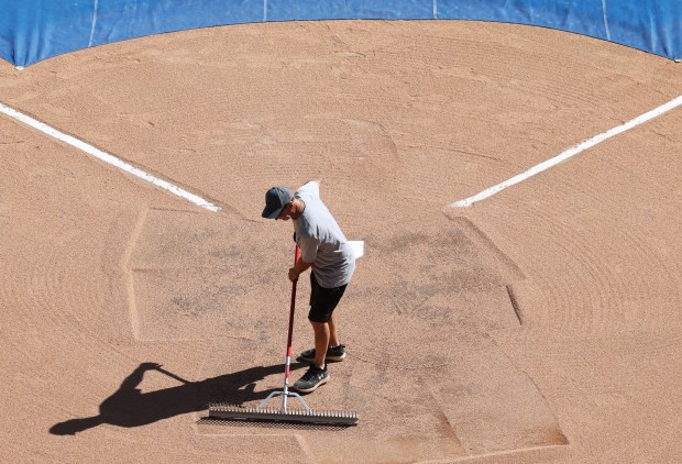 White Sox groundskeeper Roger Bossard prepares for the final game of the season against the Twins on Oct. 5, 2022, at Guaranteed Rate Field. (John J. Kim/Chicago Tribune)