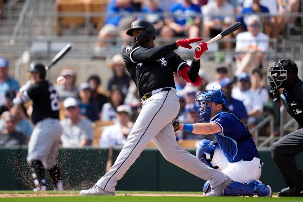 White Sox designated hitter Eloy Jimenez hits during a Cactus League game against the Dodgers on Feb. 27, 2024, in Phoenix. (Ashley Landis/AP)