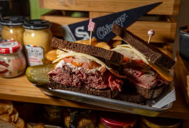 The Rumpernickel, a roast beef sandwich with sliced tomato, Vidalia onions, creamy garlic dressing and muenster cheese on toasted pumpernickel, available at the Huntington Bank Stadium Club as the White Sox preview new food offerings Thursday, March 21, 2024, at Guaranteed Rate Field. (Brian Cassella/Chicago Tribune)