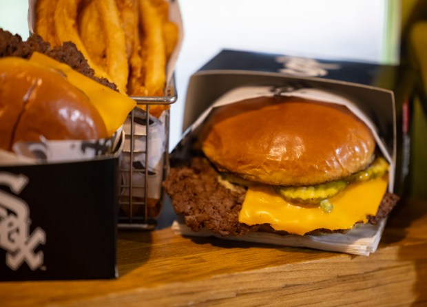 The Southside Smash Burger with a griddle smashed steak burger, American cheese, spicy bread and butter pickles and secret sauce on potato brioche available on the Club Level as the White Sox preview new food offerings Thursday, March 21, 2024, at Guaranteed Rate Field. (Brian Cassella/Chicago Tribune)