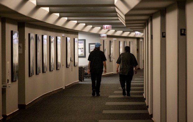 People walk on the suites level as the White Sox preview new food offerings Thursday, March 21, 2024, at Guaranteed Rate Field. (Brian Cassella/Chicago Tribune)