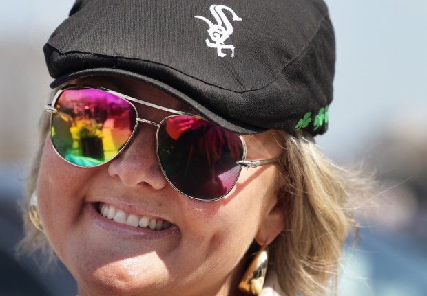 Jennifer Rice, of Libertyville, hangs out with friends before the White Sox home opener at Guaranteed Rate Field on March 28, 2024, in Chicago. (Stacey Wescott/Chicago Tribune)