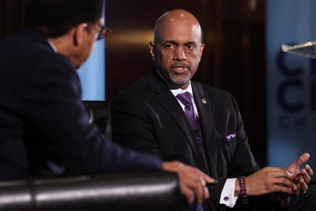 Cook County State's candidate Clayton Harris, right, discusses his candidacy with moderator Duane Deskins at the City Club in Chicago on March 7, 2024. (Antonio Perez/Chicago Tribune)