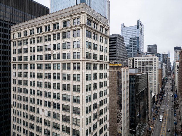 The Consumers, left, and Century Buildings, at 220 and 202 S. State St., remain in danger of demolition from the federal government's plan to protect Dirksen U.S. Courthouse, left, on March 5, 2024, in the Loop. (Brian Cassella/Chicago Tribune)