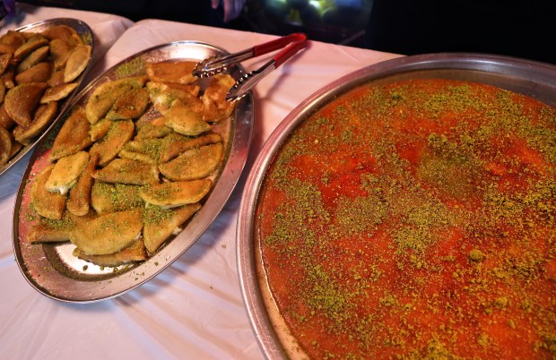 Detail of chenafa, right, at Al Bawadi Grill in Bridgeview during the Iftar as people break their daily fast during Ramadan on Friday, March 15, 2024. (Chris Sweda/Chicago Tribune)