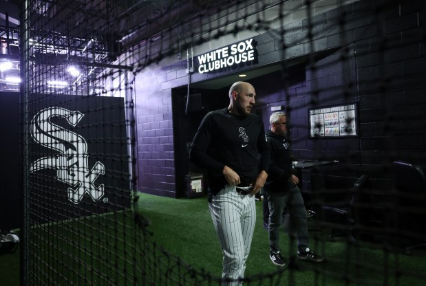 White Sox pitcher Garrett Crochet walks toward reporters before a team workout at Guaranteed Rate Field Wednesday, March 27, 2024, in Chicago. Crochet is scheduled to start on Opening Day against the Tigers. (John J. Kim/Chicago Tribune)