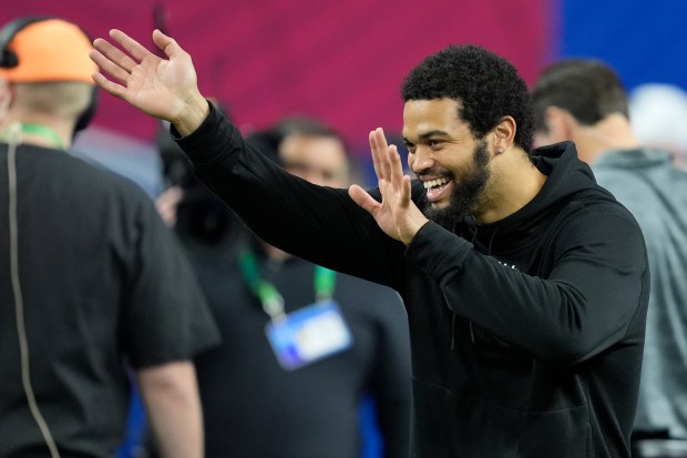 USC quarterback Caleb Williams watches as players run a drill at the NFL scouting combine on March 2, 2024, in Indianapolis. (AP Photo/Michael Conroy)