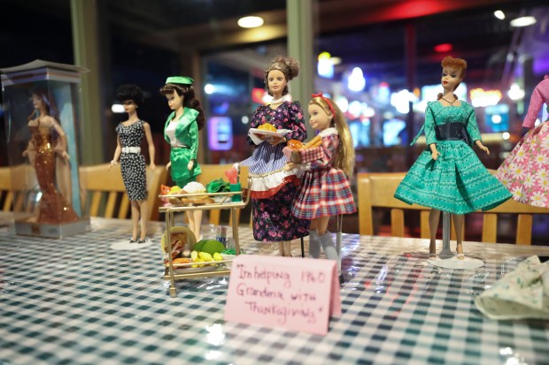 Barbie models are seen on a table during a monthly meeting of Windy City Collectors on Nov. 9, 2023. (Trent Sprague/Chicago Tribune)