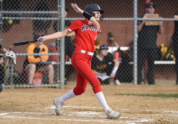 Marist's Camryn Lyons (10) connects and follows through against Andrew Monday, March 21, 2022 in Chicago, IL. (Steve Johnston / Daily Southtown)