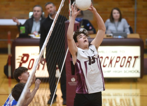 Lockport's Evan Dziadkowiec (15) sets the ball against Lincoln-Way East during a SouthWest Suburban Conference match in Lockport on Tuesday, April 25, 2023.