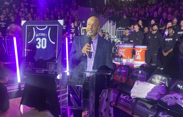 Zion Mayor and former Northwestern University basketball all-American Billy McKinney speaks at his jersey retirement ceremony. (Steve Sadin/Lake County News-Sun)