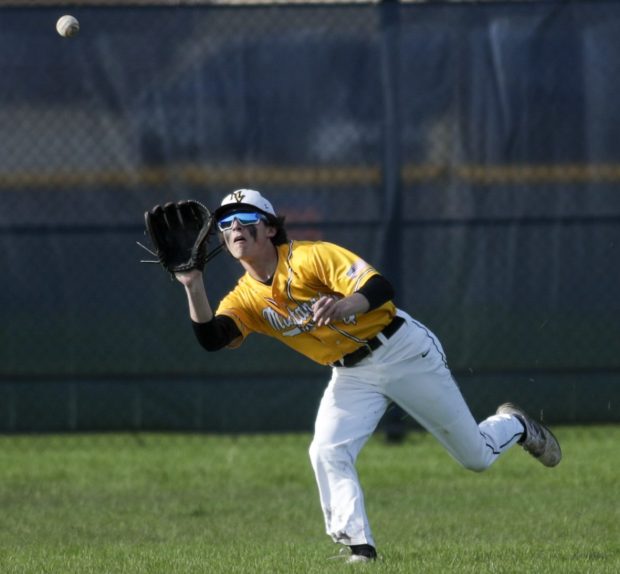 Metea's Jeremy Wrona tracks down a fly ball against Naperville North during a DuPage Valley Conference game in Naperville, Ill. on Wednesday, May 4, 2022.(Mike Mantucca-Naperville Sun)
