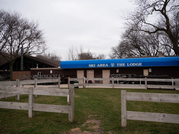 Closed for the season, a ski area and lodge bordering the ski slope at Four Lakes Alpine Snowsports in Lisle sits empty on Mar. 7, 2024. (Tess Kenny/Naperville Sun)